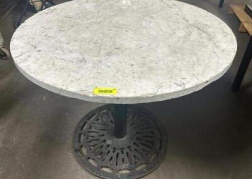 DESCRIPTION 30" ROUND MARBLE TABLE W/ CAST IRON BASE. SIZE 30" R LOCATION BAY 6 QTY 1