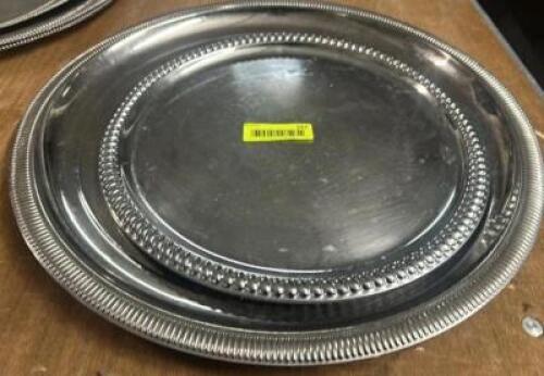 DESCRIPTION (2) ASSORTED ROUND STAINLESS SERVING TRAYS THIS LOT IS: SOLD BY THE PIECE LOCATION BAY 6 QTY 2