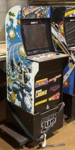 DESCRIPTION: STAND UP RETRO ARCADE MACHINE BRAND / MODEL: ARCADE UP ADDITIONAL INFORMATION: SEE PHOTOS FOR CONSOLES INSTALLED GAMES. SIZE: APPROX. 4'