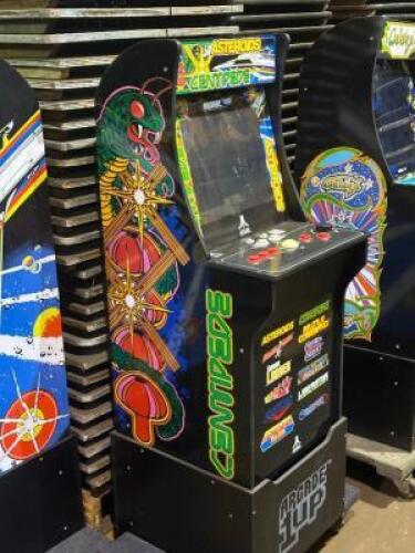 DESCRIPTION: STAND UP RETRO ARCADE MACHINE BRAND / MODEL: ARCADE UP ADDITIONAL INFORMATION: SEE PHOTOS FOR CONSOLES INSTALLED GAMES. SIZE: APPROX. 4'