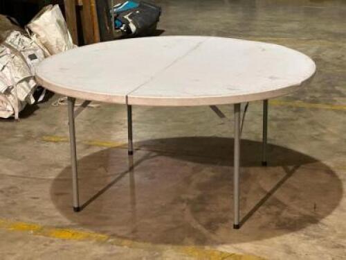 DESCRIPTION: ROUND RESIN FOLDING TABLE SIZE: 72" LOCATION: FIRST FLOOR THIS LOT IS: ONE MONEY QTY: 1
