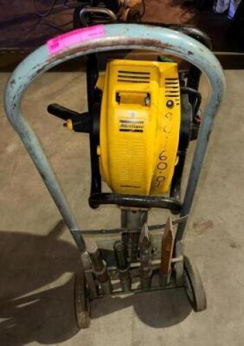DESCRIPTION: JACK HAMMER BRAND / MODEL: ATLAS COPCO RETAIL PRICE: $5,000 ADDITIONAL INFORMATION: WITH DOLLY AND ASSORTED BITS LOCATION: LEVEL 1 QTY: 1