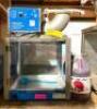 DESCRIPTION: SNO CONE MACHINE WITH FLAVORING BRAND/MODEL: PARAGON 6133310 LOCATION: ELECTRONICS CAGE QTY: 1