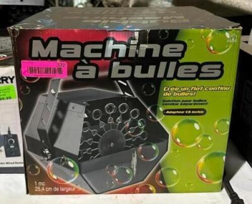 DESCRIPTION: BUBBLE MACHINE LOCATION: OUTSIDE ELECTRONICS CAGE QTY: 1