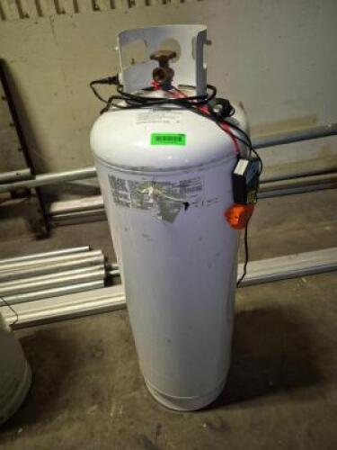 DESCRIPTION: 100 LB. PROPANE TANK LOCATION: 1ST FLOOR QTY: 1