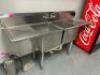 DESCRIPTION: 72" TWO WELL STAINLESS PREP SINK W/ LEFT AND RIGHT DRY BOARDS. BRAND / MODEL: UNIVERSAL. ADDITIONAL INFORMATION SINGLE FAUCET SIZE: 72" L - 2