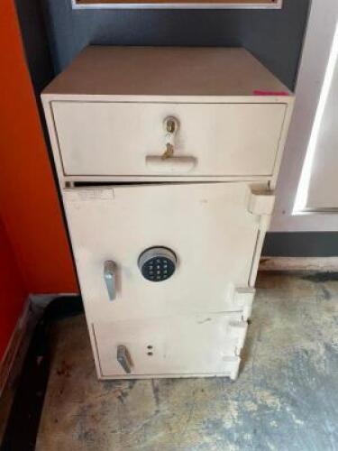 DESCRIPTION: THREE COMPARTMENT SAFE W/ KEY ADDITIONAL INFORMATION OPEN, NO COMBO LOCATION: OFFICE QTY: 1