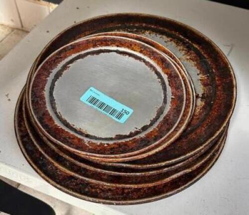 DESCRIPTION: (8) SMALL PIZZA PANS LOCATION: KITCHEN QTY: 1