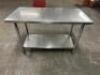 48" X 24" STAINLESS TABLE.
