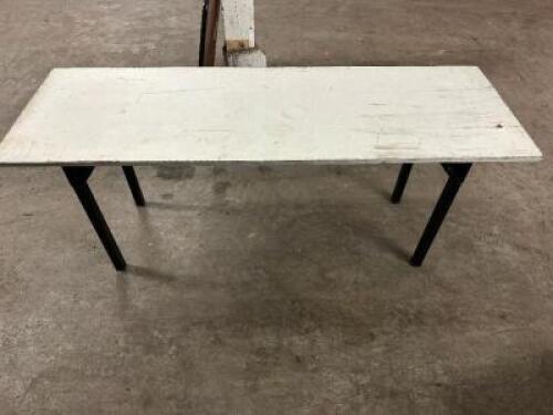 60" X 24" FOLDING TABLE.