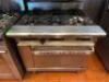 AMERICAN RANGE SIX BURNER RANGE W/ LOWER OVEN.