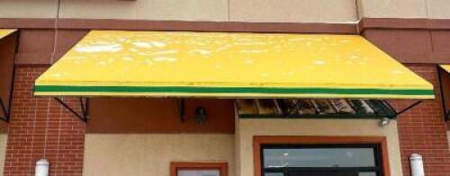 15' X 36" METAL FRAMED AWNING W/ YELLOW AND WHITE CANVAS COVER
