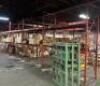 (4) - SECTIONS OF 12' TEAR DROP PALLET RACKING WITH WOOD DECKING