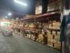 (7) - SECTIONS OF 12' TEAR DROP PALLET RACKING WITH WOOD DECKING