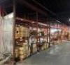 (7) - SECTIONS OF 12' TEAR DROP PALLET RACKING WITH WOOD DECKING - 4