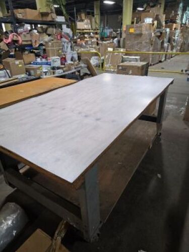 DESCRIPTION: (1) WORK TABLE WITH ACRYLIC COVER, HEAVY DUTYSIZE: 48 IN W X 96 IN L X 37 1/2"INFORMATION: HAS CASTERSQTY: 1