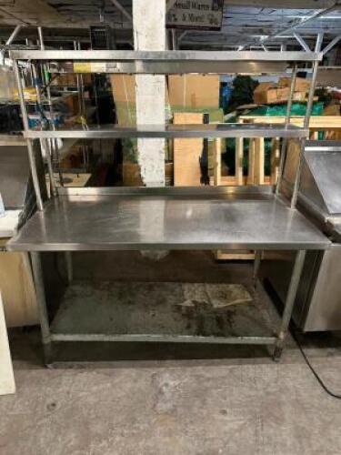 DESCRIPTION 60" X 30" STAINLESS TABLE W/ TWO TIER STAINLESS RISER AND 48" HEAT LAMP ADDITIONAL INFORMATION 115 VOLT, 1 PHASE SIZE 72" X 30" LOCATION B