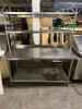 DESCRIPTION 60" X 30" STAINLESS TABLE W/ TWO TIER STAINLESS RISER AND 48" HEAT LAMP ADDITIONAL INFORMATION 115 VOLT, 1 PHASE SIZE 72" X 30" LOCATION B