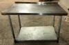 DESCRIPTION 48" X 30" STAINLESS TABLE W/ UNDER SHELF AND 1" BACK SPLASH. ADDITIONAL INFORMATION CONTENTS ARE NOT INCLUDED. SIZE 48" X 30" LOCATION BAY