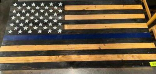 DESCRIPTION 36" X 18" THIN BLUE LINE WOODED AMERICAN FLAG. SIZE 36" X 18" LOCATION BAY 6 QTY 1