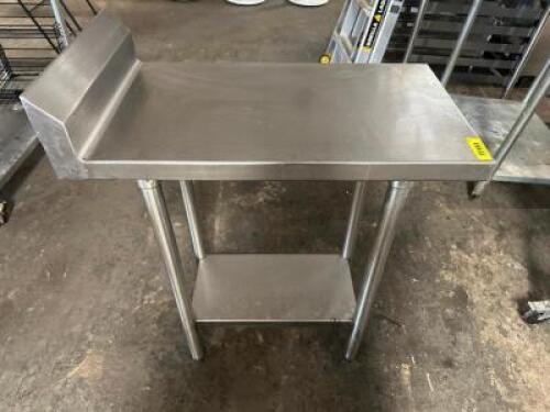 DESCRIPTION 30" X 18" STAINLESS TABLE W/ 4" BACK SPLASH ADDITIONAL INFORMATION W/ GALV UNDER SHELF. SIZE 30" X 18" LOCATION BAY 6 QTY 1