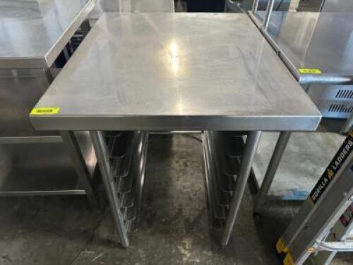 DESCRIPTION 36" X 30" ALL STAINLESS TABLE W/ LOWER TRAY RACK STORAGE. SIZE 36" X 30" LOCATION BAY 6 QTY 1