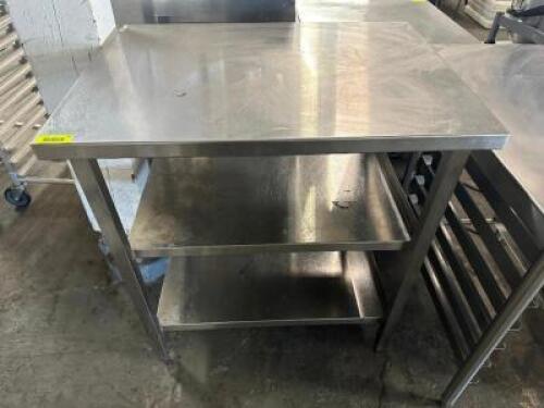 DESCRIPTION 36" X 25" ALL STAINLESS TABLE W/ TWO TIER LOWER STORAGE. SIZE 36" X 25" LOCATION BAY 6 QTY 1