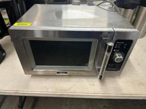 DESCRIPTION MIDEA 1000 WATT MICROWAVE. BRAND / MODEL: MIDEA 1025F0A LOCATION BAY 6 QTY 1