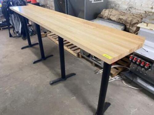 DESCRIPTION 9' X 14" BUTCHER BLOCK STYLE BAR RAIL W/ (4) 42" PUB BASES, SIZE 9' X 14" X 42" LOCATION BAY 6 QTY 1