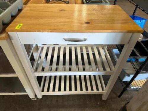 DESCRIPTION 31" X 17" WOODEN ACCENT SHELF / CART, ADDITIONAL INFORMATION HAS (1) SET OF CASTER SIZE 31" X 17.5 LOCATION BAY 6 QTY 1
