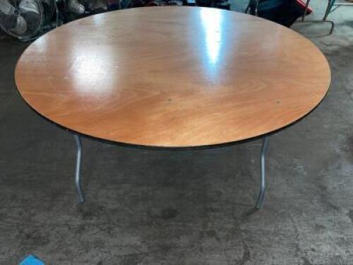 DESCRIPTION 60" BANQUET ROUND FOLDING TABLE W/ WOODEN TOP. LOCATION BAY 7 QUANTITY 1