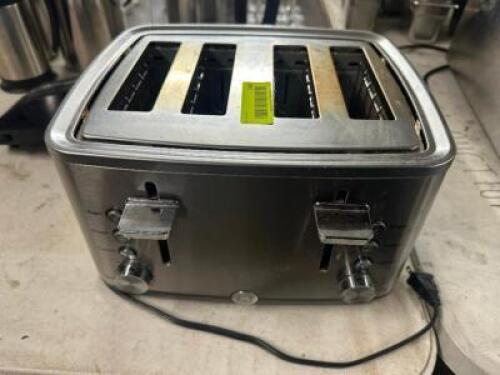 DESCRIPTION FOUR GROUP HOUSE HOLD TOASTER. LOCATION BAY 6 QTY 1