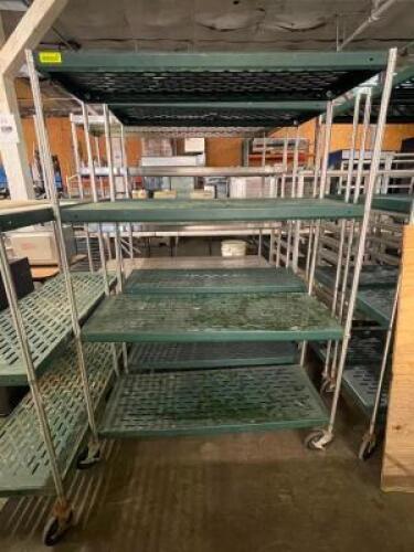 DESCRIPTION: (2) 48" X 18" FOUR TIER METAL RACK - ON CASTERS. SIZE: 48" X 18" X 72" LOCATION: BAY 7 THIS LOT IS: SOLD BY THE PIECE QTY: 2
