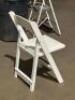(5) - WHITE PADDED RESIN FOLDING CHAIRS - 11