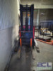 3000 LBS. CAP. ELECTRIC STAND UP FOLK LIFT - 22