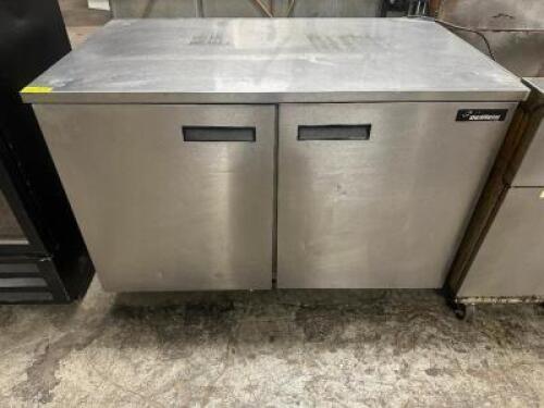 DESCRIPTION DELFIELD 48" TWO DOOR WORK TOP COOLER. BRAND / MODEL: DELFIELD UC4048 ADDITIONAL INFORMATION 115 VOLT, 1 PHASE. TESTED AND WORKING LOCATIO