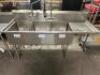 DESCRIPTION 75" THREE WELL STAINLESS POT SINK W/ SPRAYER AND RIGHT SIDE DRY BOARD. SIZE 75" LOCATION BAY 6 QTY 1 - 2