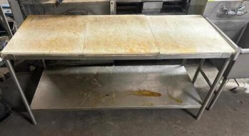 DESCRIPTION 72" X 30" STAINLESS TABLE W/ WHITE PLASTIC CUTTING BOARD TOP. SIZE 72" X 30" LOCATION BAY 6 QTY 1