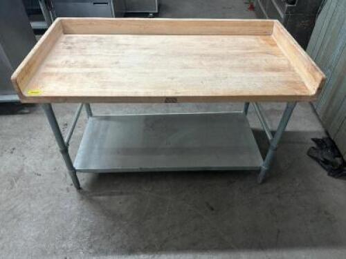 DESCRIPTION 60" X 30" BOOS BUTCHER BLOCK PASTRY TABLE W/ 4" SIDE AND BACK SPLASH BRAND / MODEL: JOHN BOOS SIZE 60" X 30" LOCATION BAY 6 QTY 1