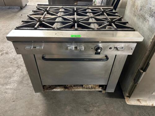 SIX BURNER RANGE W/ LOWER OVEN.