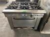 SIX BURNER RANGE W/ LOWER OVEN.