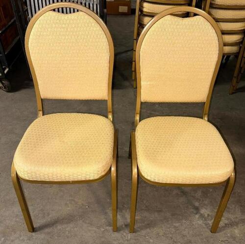 (8) GOLD UPHOLSTERED STACKING BANQUET CHAIRS.