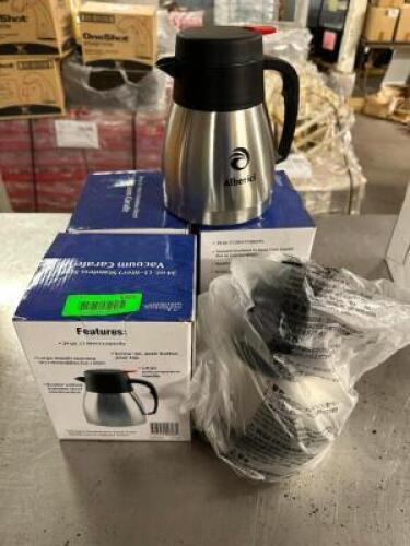 (5) ASSORTED NEW STAINLESS DECANTERS.