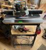 INFINITY ROUTER TABLE W/ TRITON TRA001 DUAL MODE PLUNGE ROUTER. INCLUDES POWER FEED
