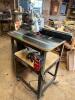 INFINITY ROUTER TABLE W/ TRITON TRA001 DUAL MODE PLUNGE ROUTER. INCLUDES POWER FEED - 5