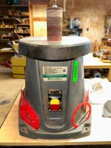 OSCILLATING SPINDLE SANDER.