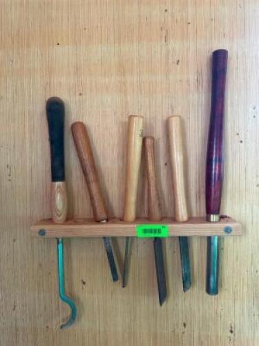 (6) ASSORTED LATHE TOOLS W/ WALL MOUNTED HOLDER.