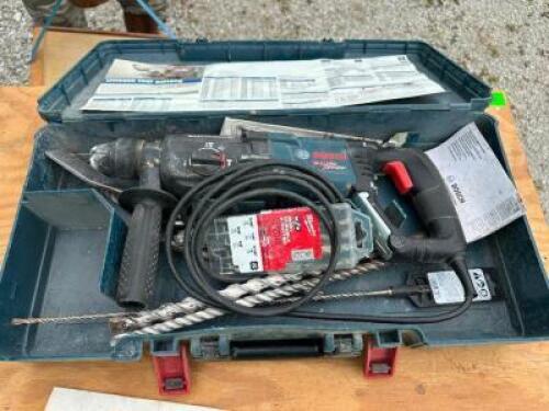 BOSCH ROTARY HAMMER KIT W/ CASE AND TOOLING.