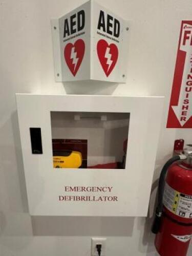AED DEFIBRILLATOR WITH ACCESSORIES AND MOUNTED BOX