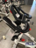 AC PERFORMANCE PLUS INDOOR SPIN CYCLE BIKE WITH CARBON BLUE BELT DRIVE AND (2) - WEIGHT BARS - 10
